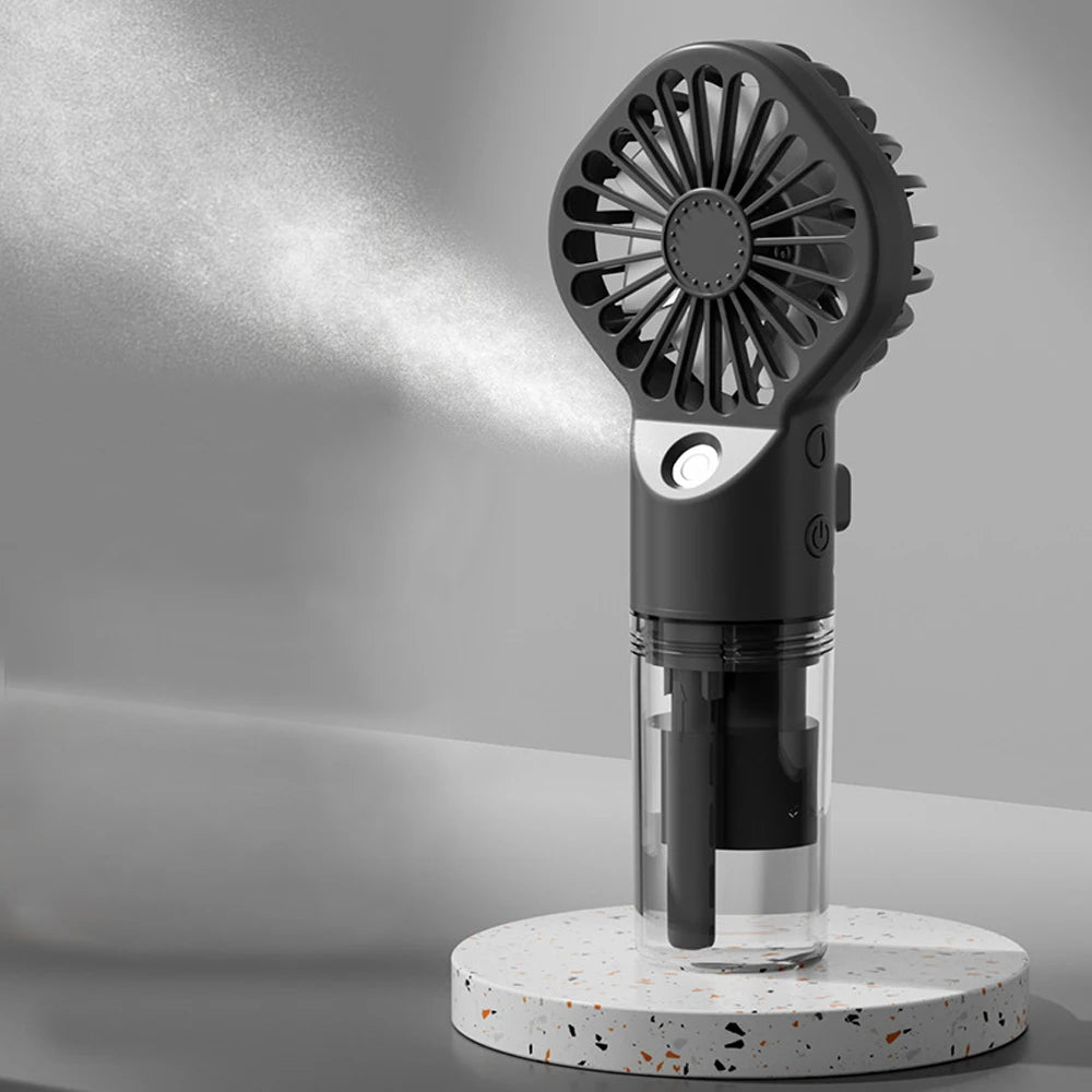Ventilateur Brumisateur Portable Frescoo® – Mini Ventilateur Rafraîchissant à Main avec Réservoir d'Eau, Rechargeable USB